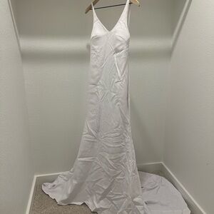 White Sleeveless V-Neck Wedding Gown